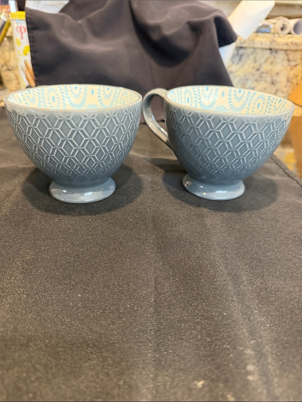 Textured Blue Ceramic Pedestal Mugs with Patterned Interior